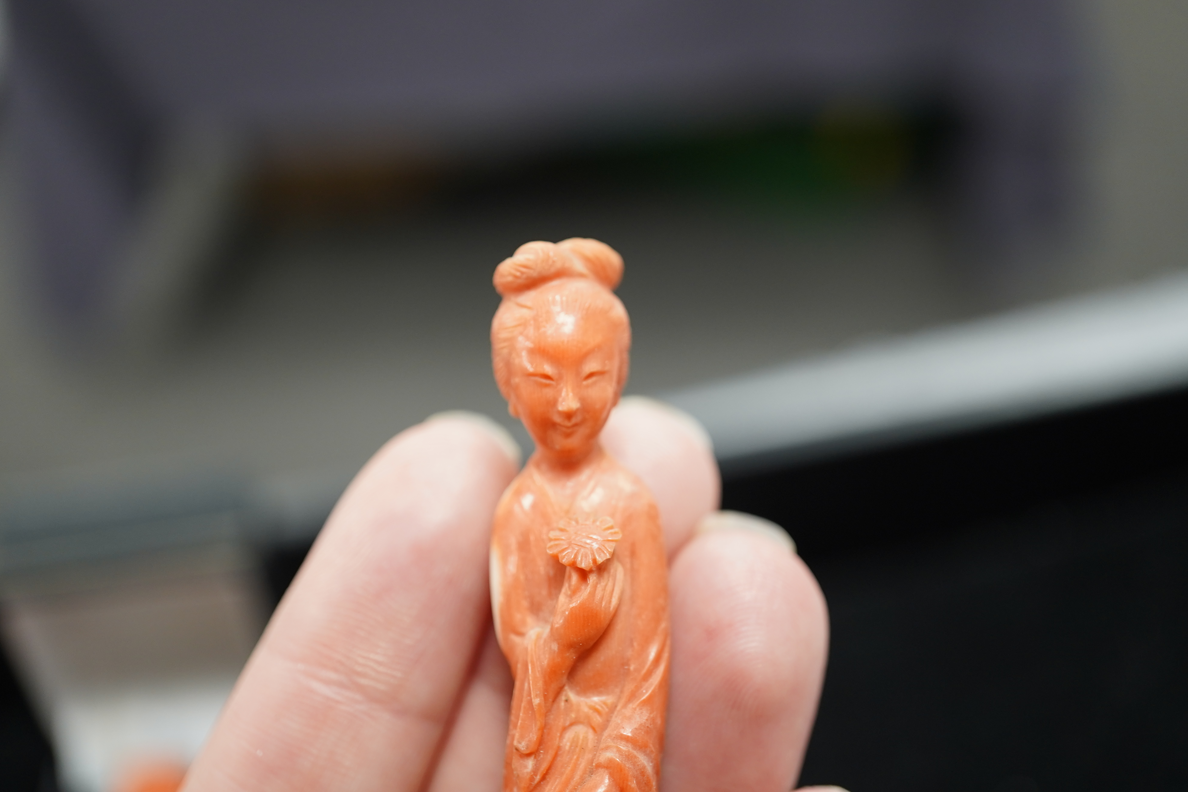 Two Chinese coral figures of ladies, early 20th century